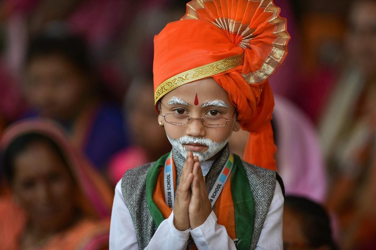 A child dressed up as PM Narendra Modi during an election rally ahead of the Lok Sabha elections, in Nandurbar district, Monday, April 22, 2019. (PTI Photo/Mitesh Bhuvad)