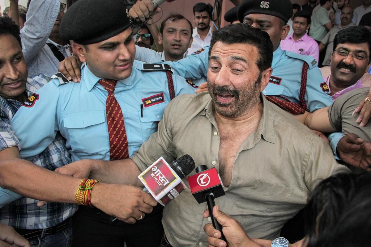 Actor Sunny Deol talks to the media as he leaves the BJP headquarter after joining the party, in New Delhi, Tuesday, April 23, 2019. (PTI Photo)