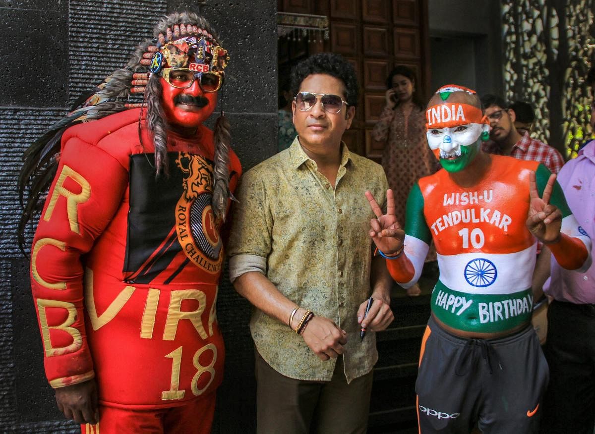 Cricket legend Sachin Tendulkar poses for photos with his fans he celebrates his 46th birthday at his residence at Bandra in Mumbai, Wednesday, April 24, 2019. (PTI Photo)