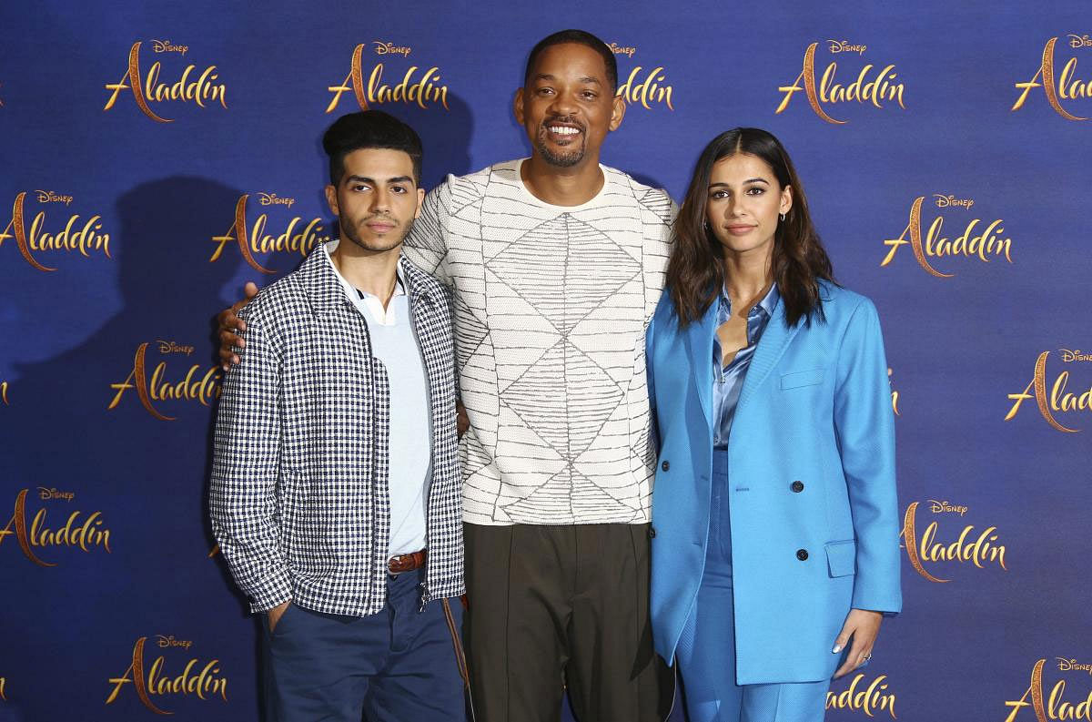 Actors Mena Massoud, from left, Will Smith and Naomi Scott pose for photographers at the photo call for the film 'Aladdin' in London, Friday, May 10, 2019. AP/PTI