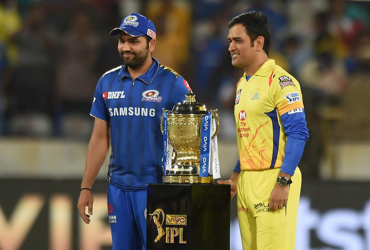 Skippers of CSK MS Dhoni and MI Rohit Sharma pose with the trophy before the Indian Premier League 2019 final cricket match between Chennai Super Kings (CSK) and Mumbai Indians (MI), at Rajiv Gandhi International Cricket Stadium in Hyderabad, Sunday, May 12, 2019. (PTI Photo)