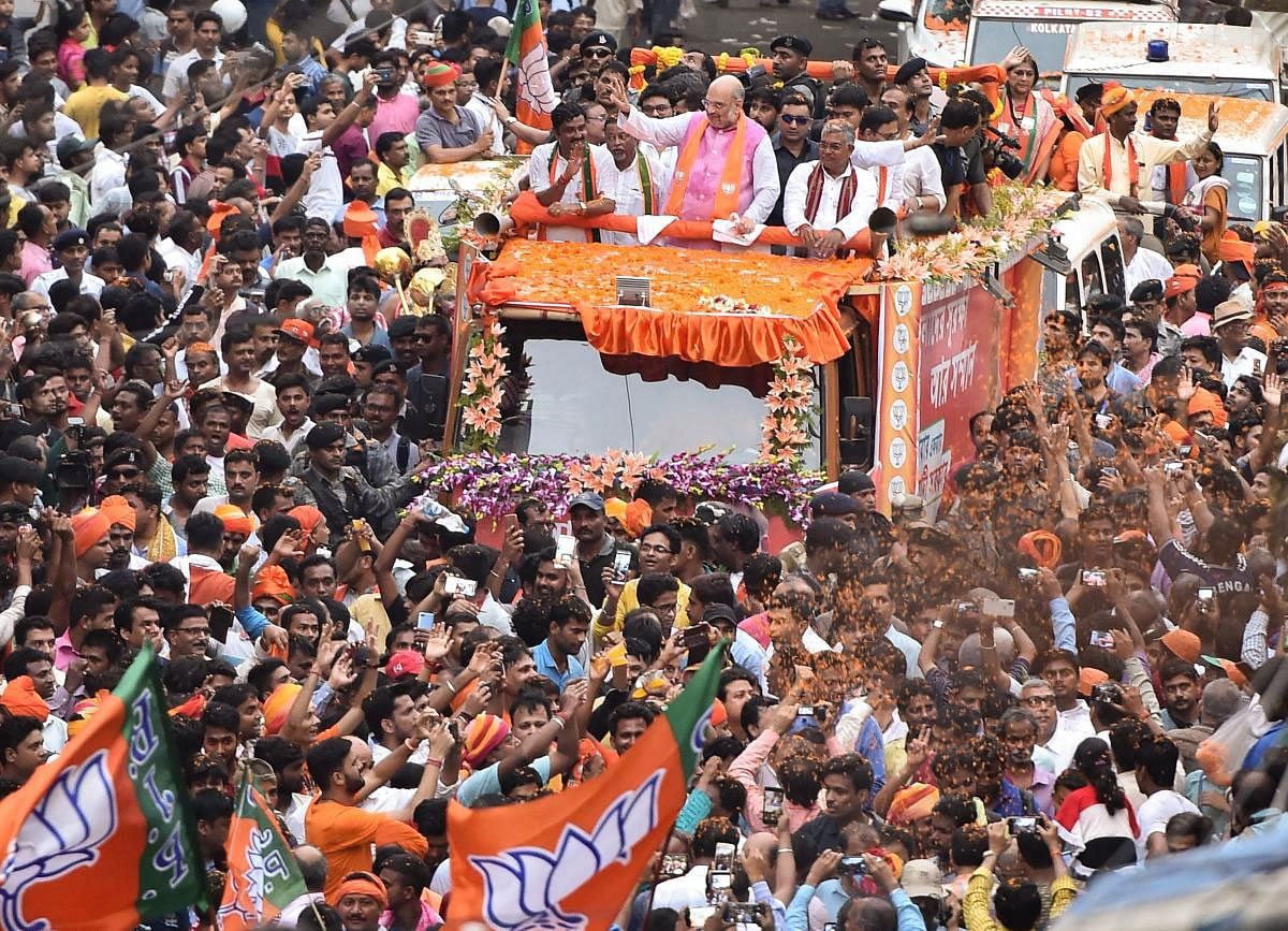 BJP National President Amit Shah during a roadshow for the last phase of Lok Sabha elections 2019, in Kolkata, Tuesday, May 14, 2019. (PTI Photo)