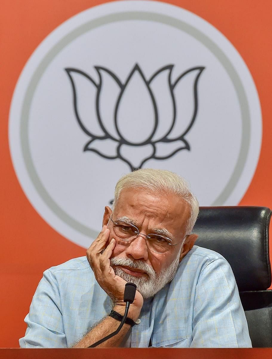 New Delhi: Prime Minister Narendra Modi reacts during a press conference at the party headquarter in New Delhi, Friday, May 17, 2019. PTI