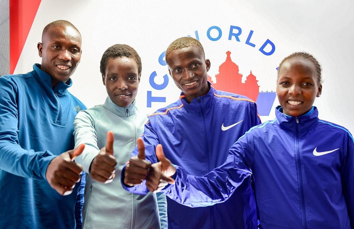Bengaluru: Kenyan athletes Paul Tanui (R), Geoffrey Koech (L), Agnes Tirop and Rose Chelimo (R) during a press conference, ahead of World 10K Marathon event, in Bengaluru, Friday, May 17, 2019. PTI