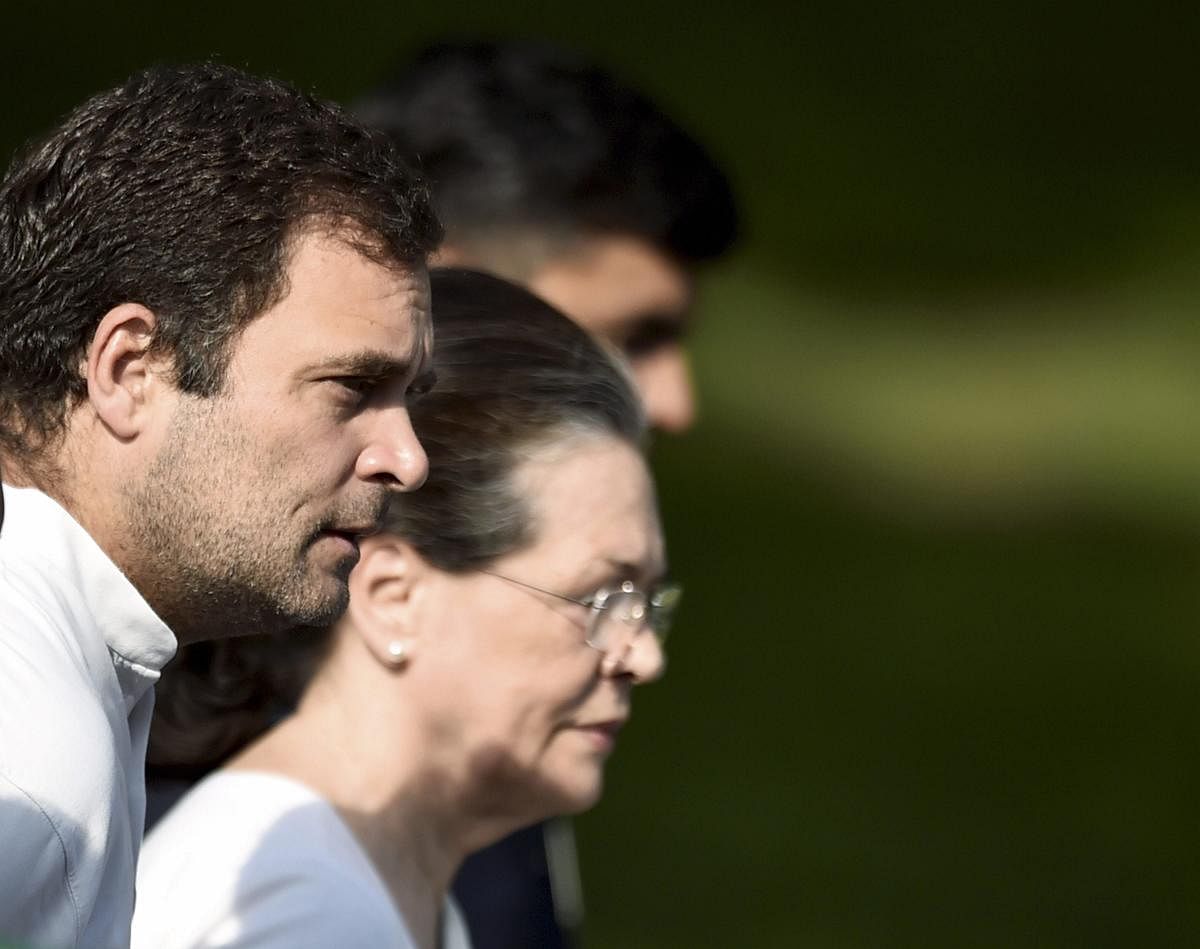 UPA Chairperson Sonia Gandhi and Congress President Rahul Gandhi leave after paying tribute to India's first Prime Minister Jawaharlal Nehru on his 55th death anniversary, at his memorial Shanti Van in New Delhi. PTI Photo