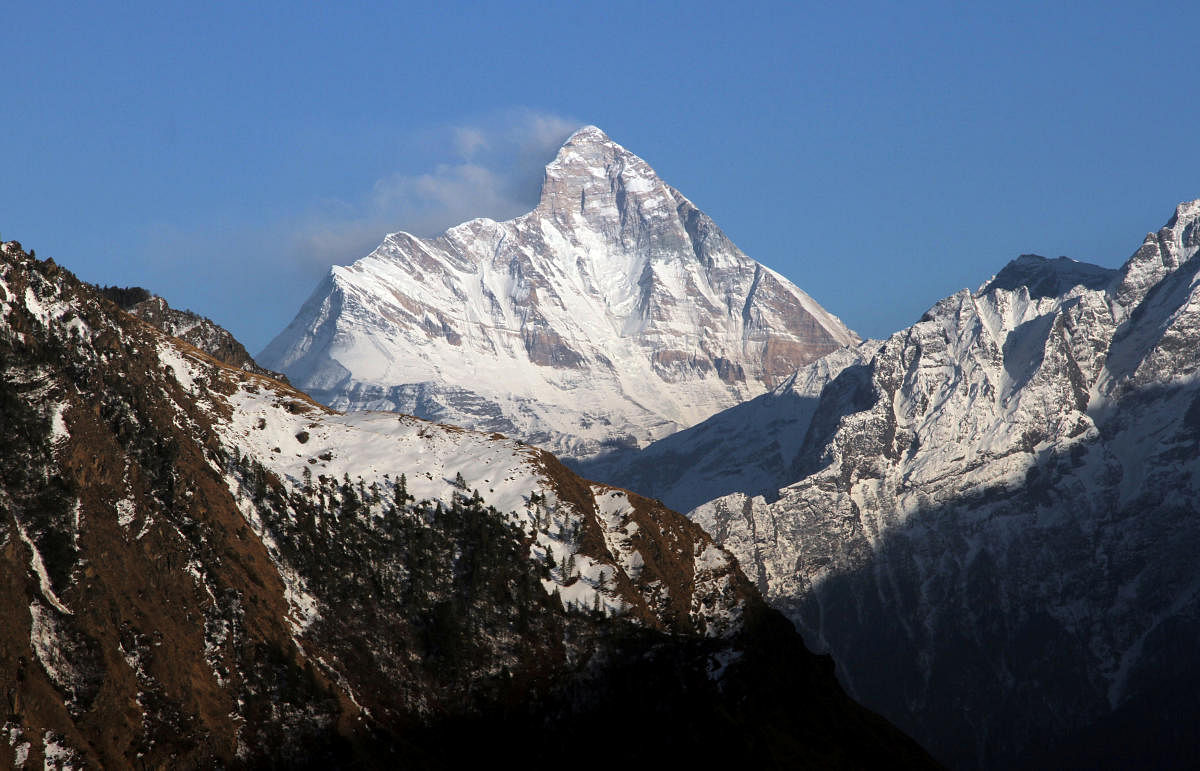 Snow-covered Nanda Devi mountain is seen from Auli town, in Uttarakhand. (Reuters Photo)
