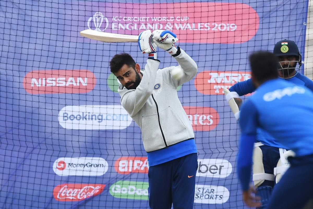 Virat Kohli bats in the nets during a training session at the Rose Bowl in Southampton ahead of their 2019 Cricket World Cup match against South Africa. (AFP Photo)