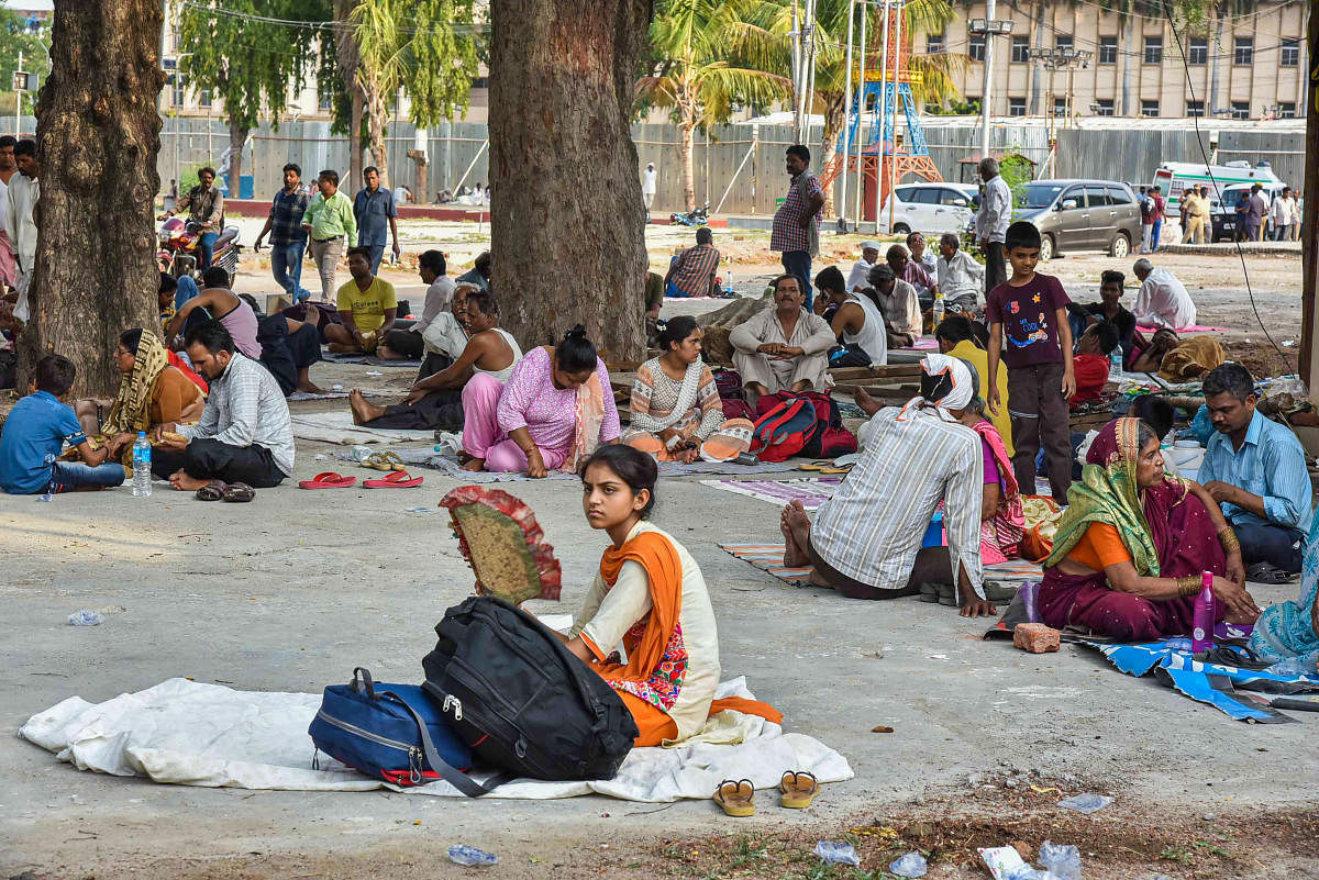 People from various parts of the country gather to receive 'fish prasadam' distributed by the Bathini family, which is believed to cure asthma, in Hyderabad, Friday, June 7, 2019. More than three lakh people are expected to come for taking the 'prasadam' this year. (PTI Photo)