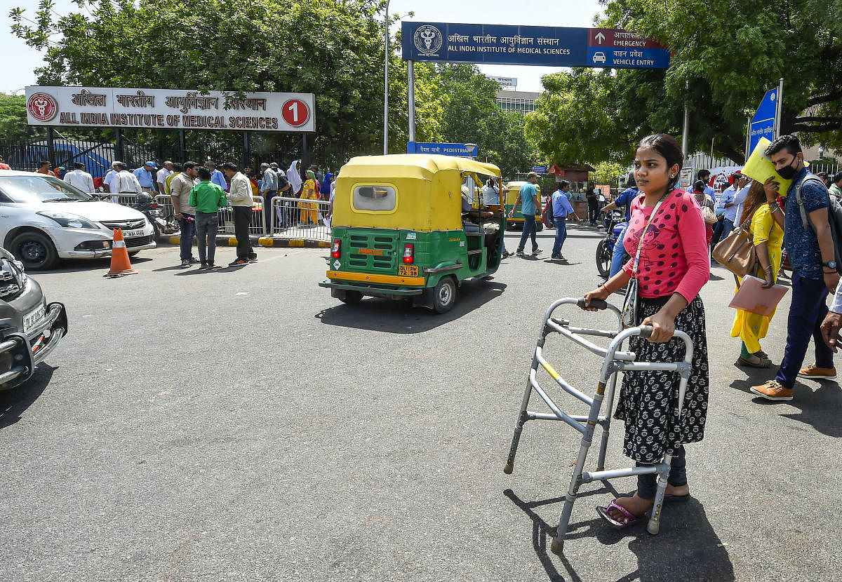 A patient seen outside AIIMS as members of Resident Doctors Association of AIIMS protest to show solidarity with their counterparts in West Bengal, who stopped work on Tuesday protesting against the assault on their colleagues, in New Delhi, Friday, June 14, 2019. PTI