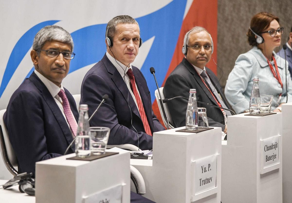 Deputy Prime Minister of Russia Yuri Trutnev (2nd L) with CII DG Chandrajeet Banerjee and others during the special session of the Eastern Economic Forum in Mumbai, Tuesday, June 18, 2019. PTI