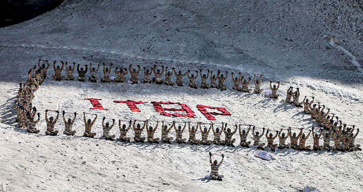 Indo-Tibetan Border Police (ITBP) troops (ITBP) perform yoga to mark the 5th International Day of Yoga, in Vasudhara glacier, near Badrinath, Friday, June 21, 2019. (PTI Photo)