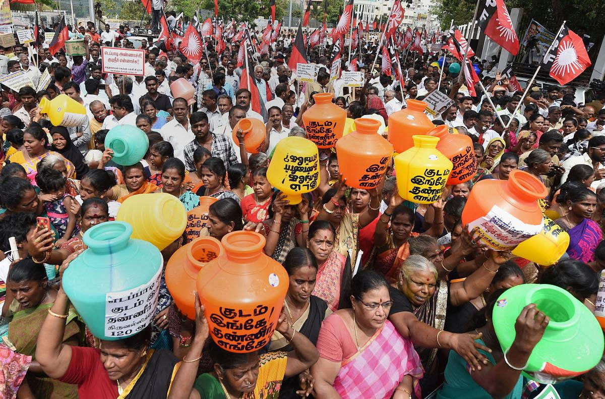 Dravida Munnetra Kazhagam (DMK) party workers stage a protest against AIADMK government over the looming water crisis in Tamil Nadu, in Chennai, Monday, June 24, 2019. (PTI Photo)