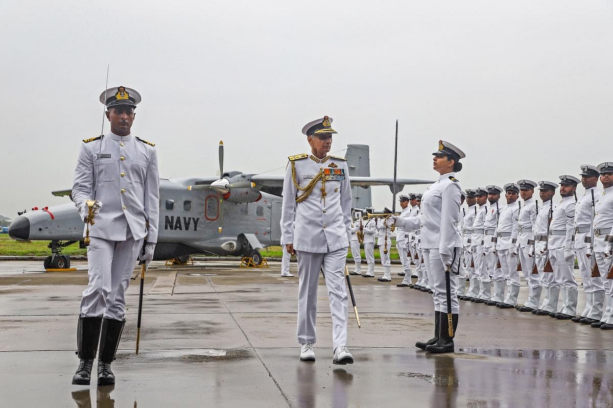 Naval Chief Admiral Karambir Singh inspects a parade during the commissioning of fifth Dornier squadron of the Indian Navy- INAS 313 (Indian Naval Air Squadron 313) at the Naval Air Enclave at Meenambakkam, in Chennai. (PTI Photo)