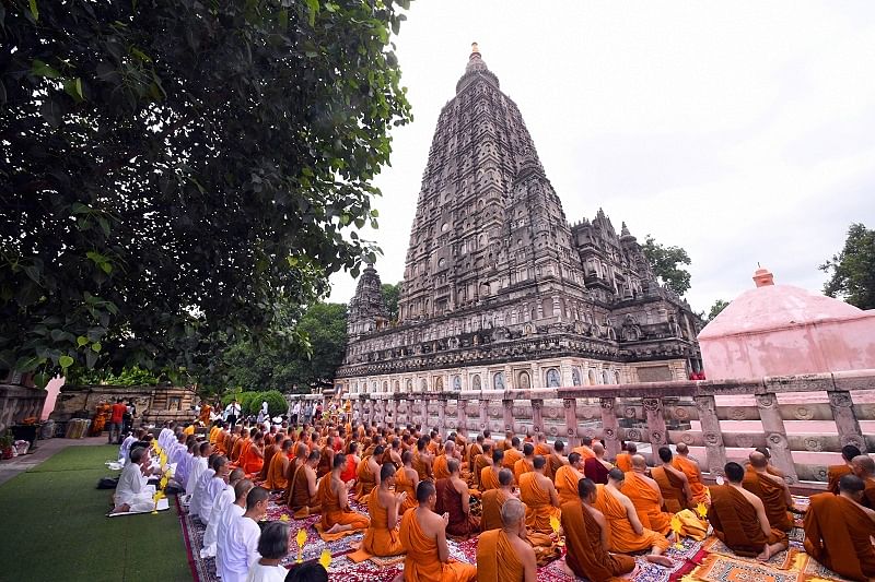Buddhist monks and devotees from Thailand offer special prayers for long life of Thai King Maha Vajrilongkorn on occasion of his 67th birthday, at Mahabodhi Temple. (PTI)