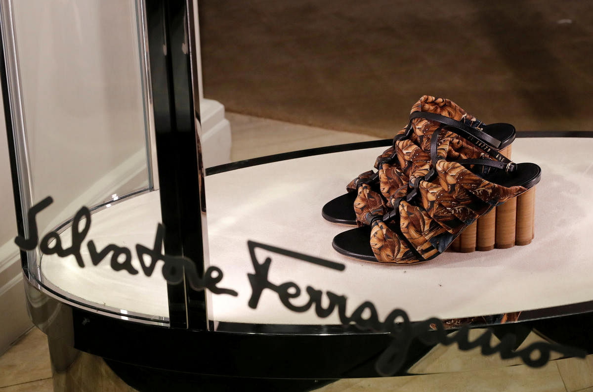 A pair of shoes of Italian luxury shoemaker Salvatore Ferragamo is displayed in the window of the company's store in Zurich, Switzerland (Reuters Photo)