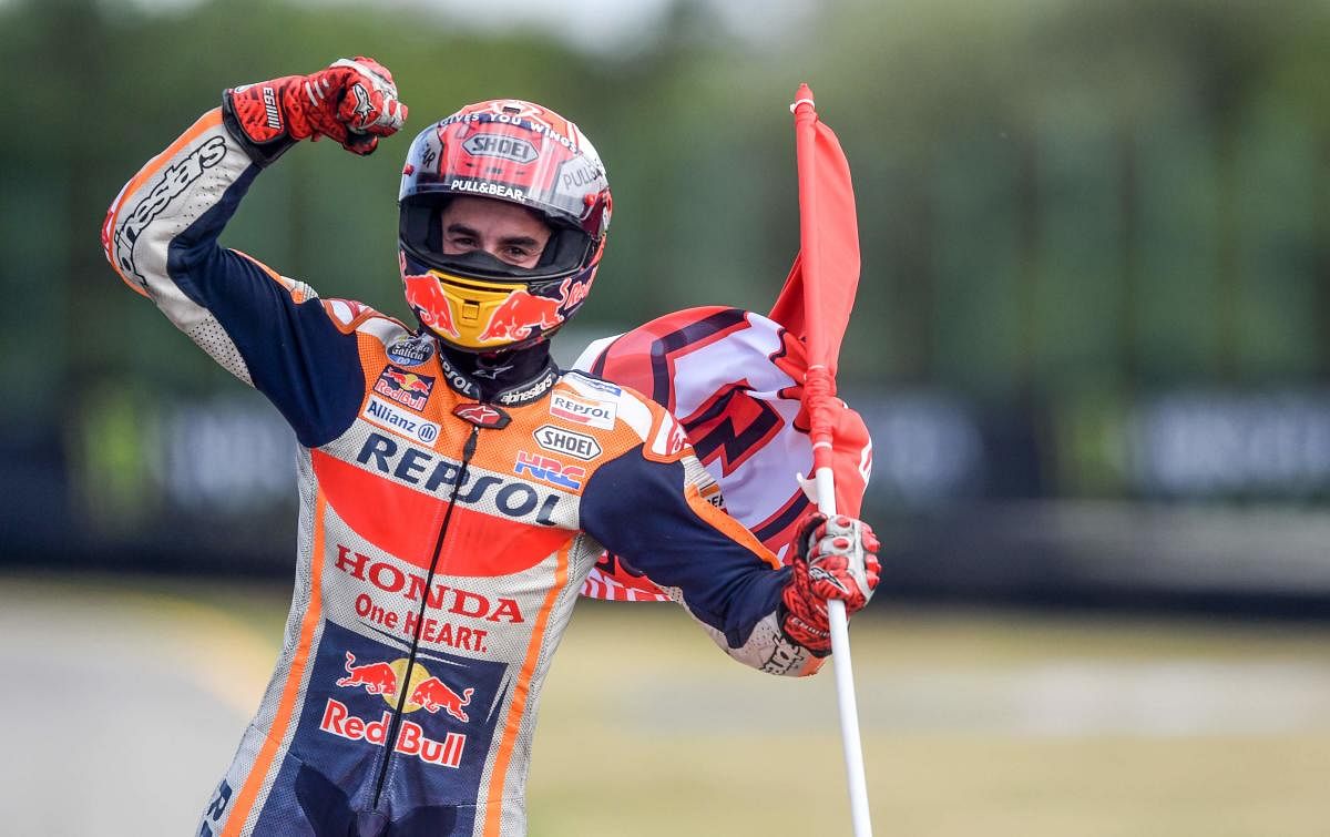 Winner Repsol Honda Team's Spanish rider Marc Marquez celebrates after the Moto GP Czech Grand Prix in Brno (AFP Photo)