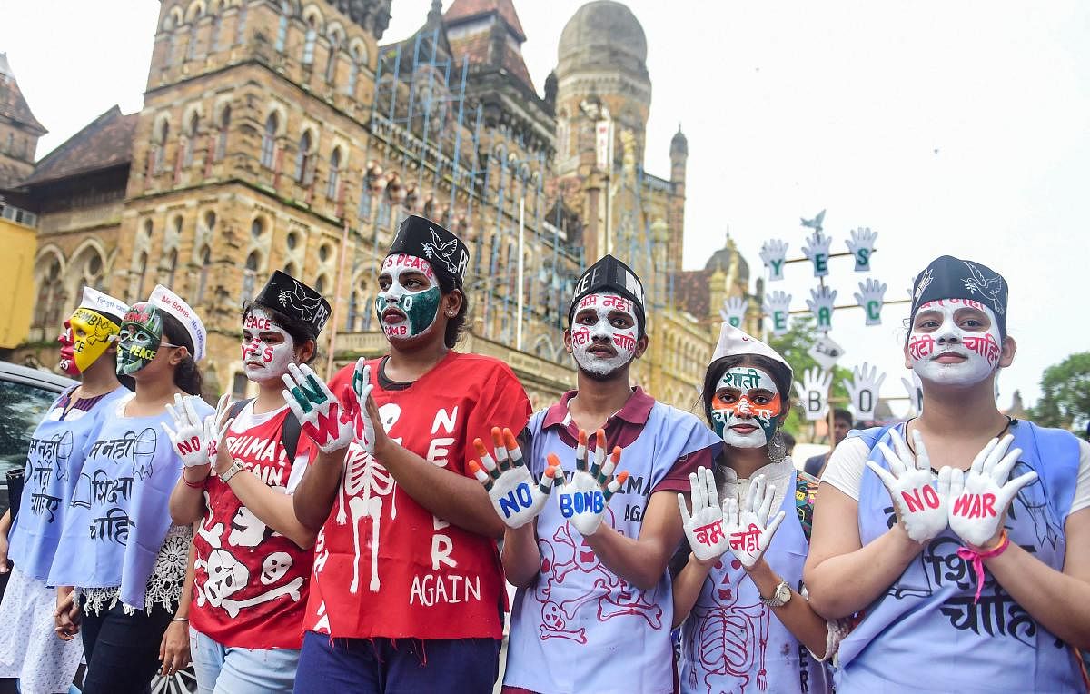Students from various colleges participate in a peace rally on the 74th anniversary of 'Hiroshima Day', in Mumba. PTI Photo