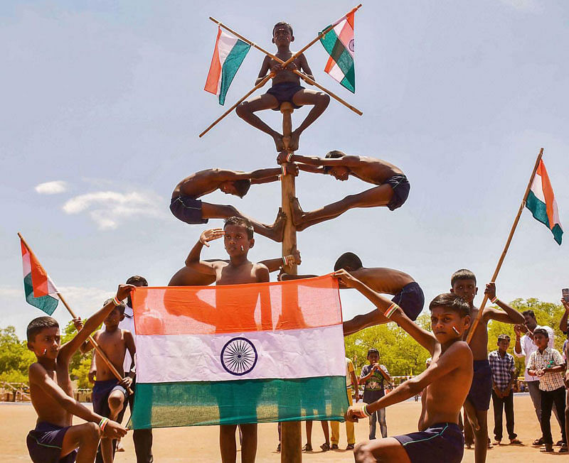Students perform 'Mallar Kambam', an ancient form of gymnastics, during 73rd Independence Day celebrations in Madurai, Thursday, Aug 15, 2019. (PTI Photo)