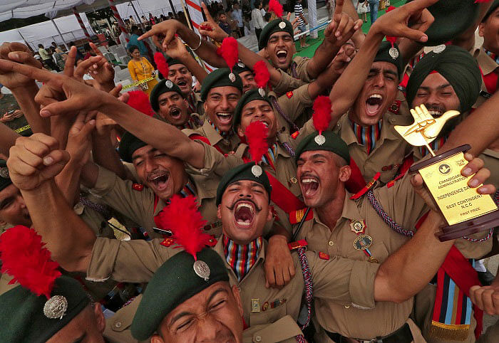 Cadets from the National Cadet Corps (NCC) celebrate after being awarded the first position in the best marching category during India's Independence Day celebrations in Chandigarh, India. (Reuters/Ajay Verma)