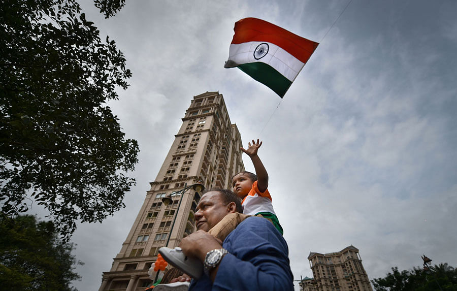 A huge tricolour being hoisted at Hiranandani Gardens, Powai, in Mumbai, Thursday, Aug. 15, 2019. (PTI Photo)