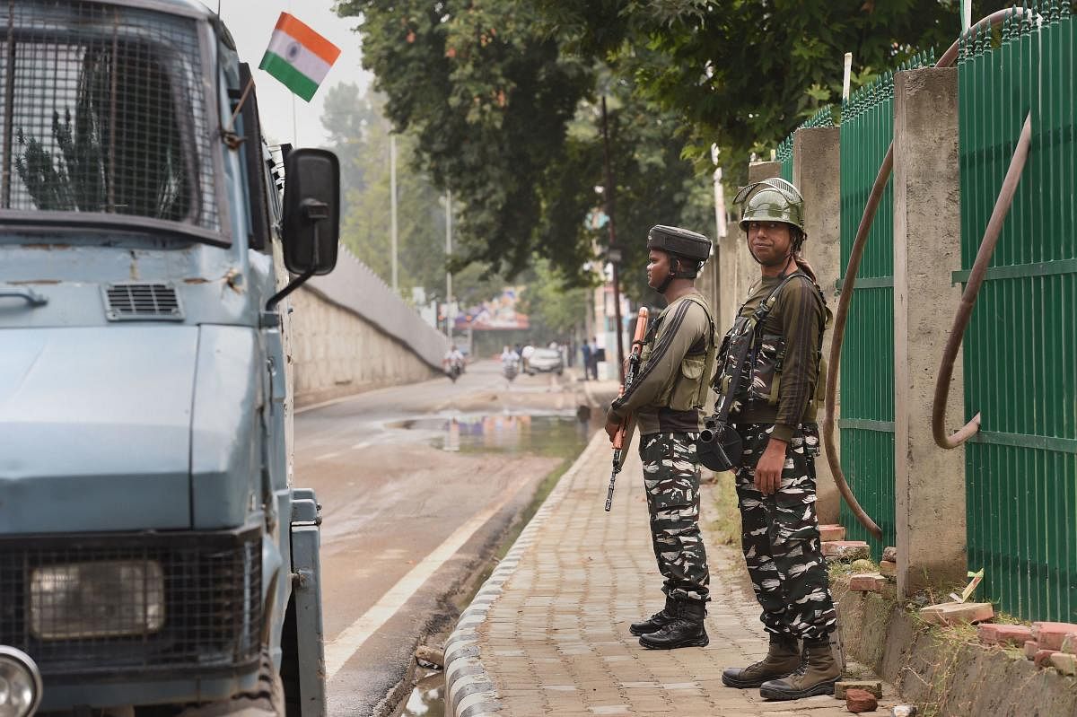 Security personnel stand guard, in Srinagar, Thursday, Aug 15, 2019. (PTI Photo)