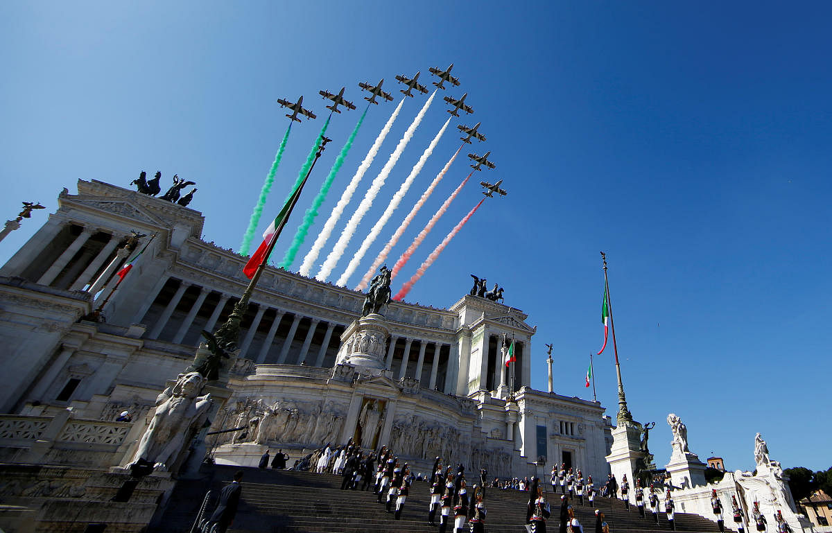 The Italian Frecce Tricolori aerobatic squad performs over the Vittoriano monument during the Republic Day military parade in Rome, Italy June 2, 2018. (Photo by Reuters)
