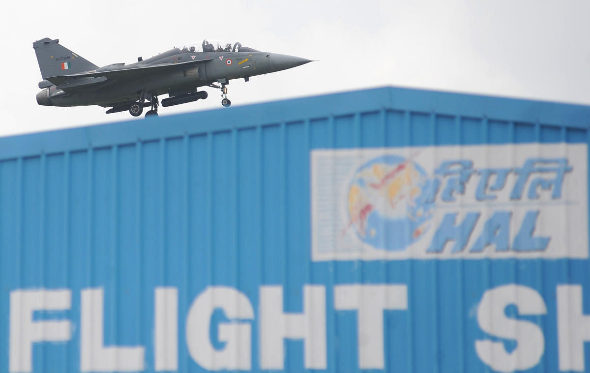 Tejas aircraft carrying Defence Minister Rajnath Singh flying over HAL. (DH Photo/Pushkar V)