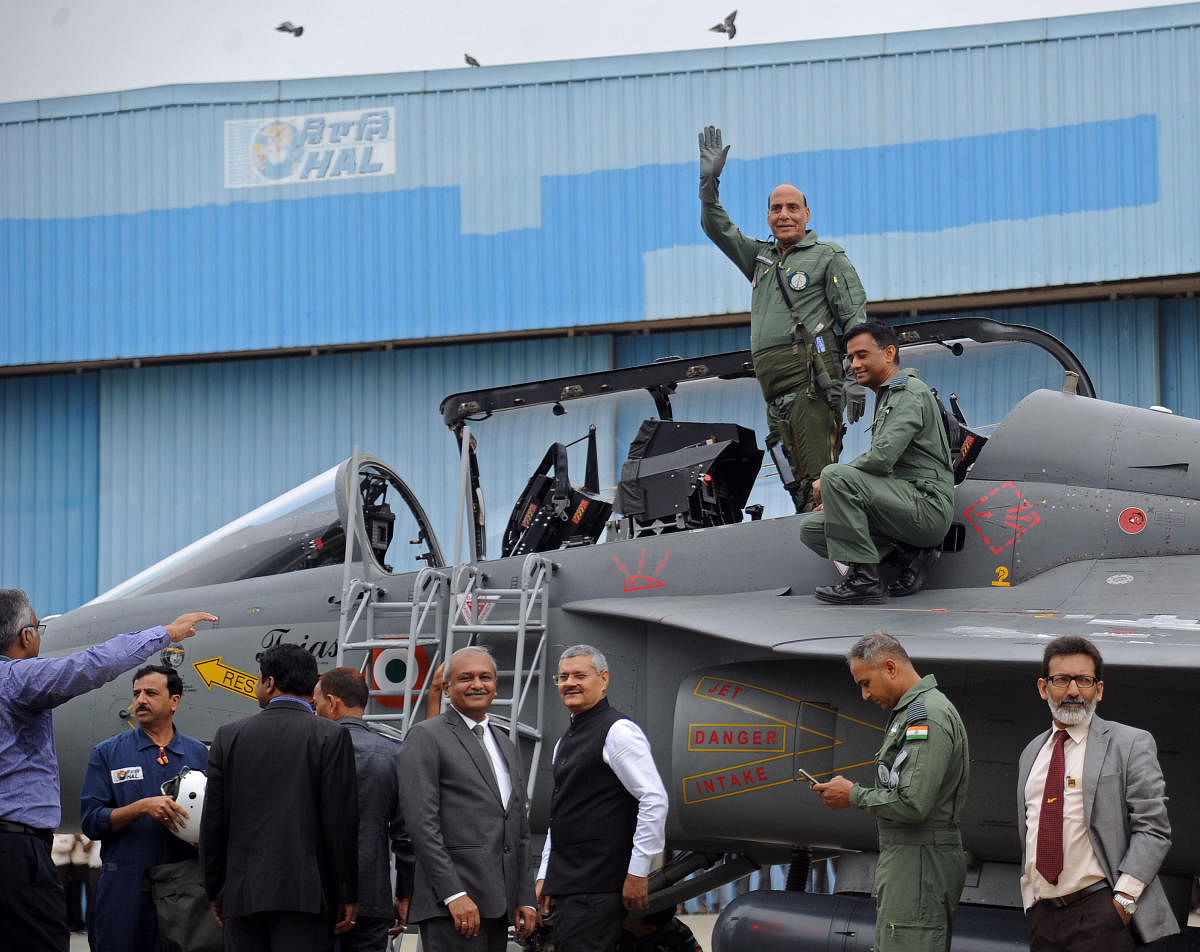 Defence Minister Rajnath Singh prepares to fly in the Tejas fighter aircraft from the HAL airport in Bengaluru on Thursday. (DH Photo/Pushkar V)