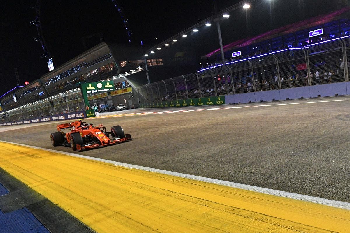 Ferrari's Monegasque driver Charles Leclerc takes part in the qualifying session for the Formula One Singapore Grand Prix at the Marina Bay Street Circuit in Singapore. (AFP Photo)