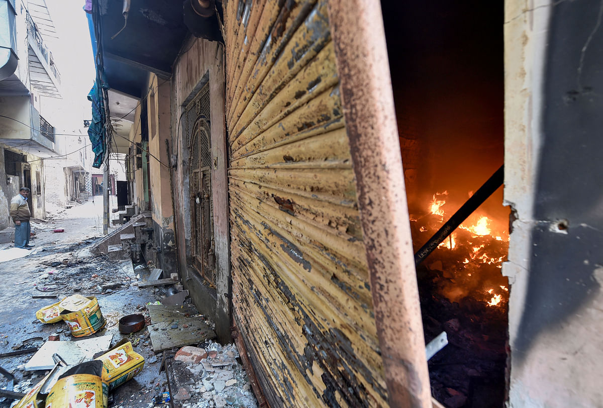 Shops set ablaze by rioters during communal violence over the amended citizenship law at Shiv Vihar area of the riot-affected north east Delhi. (PTI Photo)
