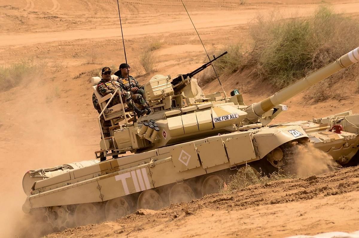 Army tanks participate in 'Vijay Prahar' military exercise at Mahajan Field Firing Range near Bikaner in Rajasthan on Wednesday.