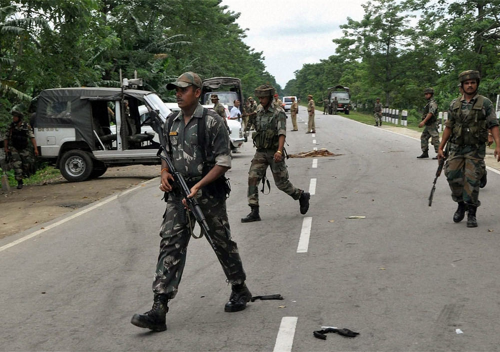 Tezpur: Security personnel in curfew-bound Tezpur in Assam on Tuesday. PTI Photo