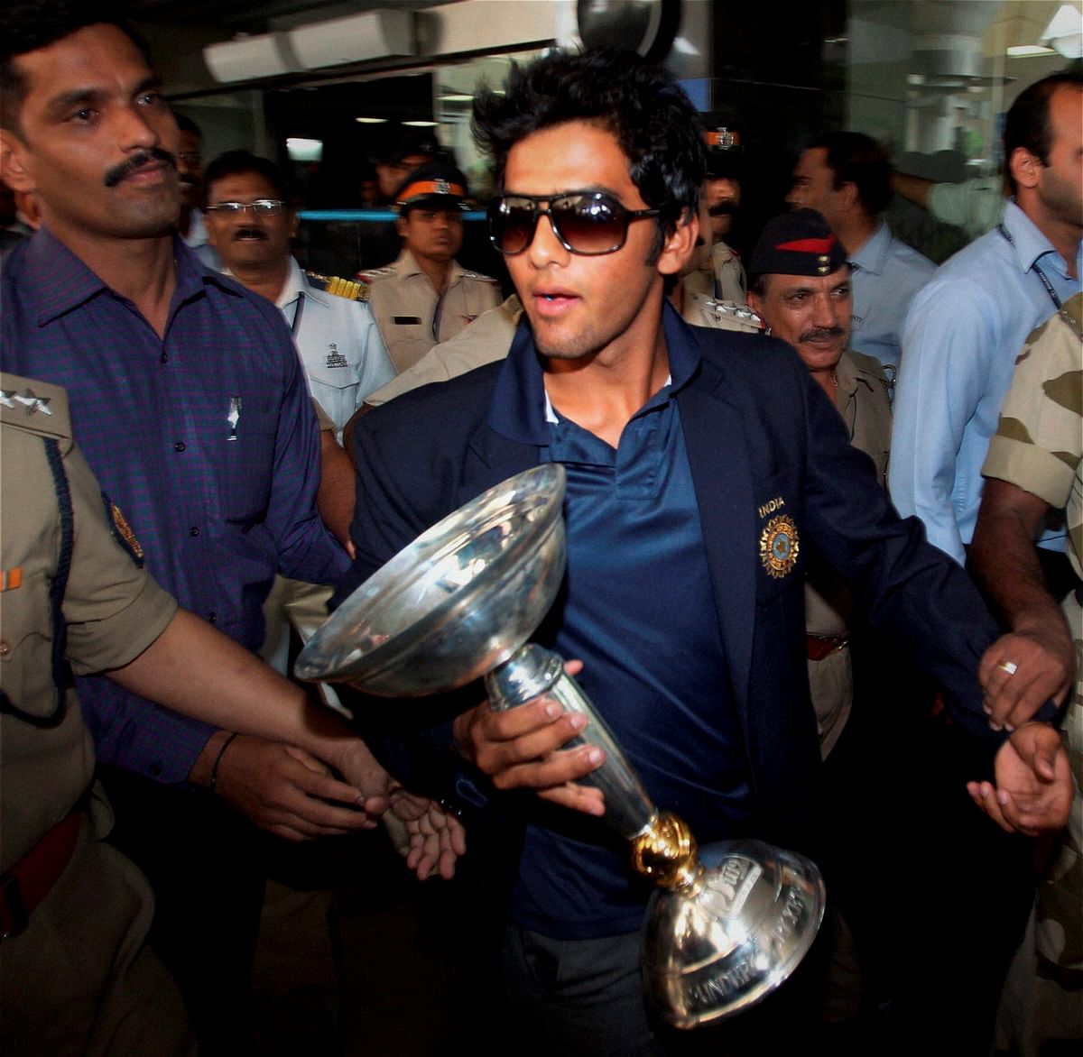 Under-19 Team India captain Unmukt Chand on his arrival at the airport in Mumbai on Tuesday. PTI