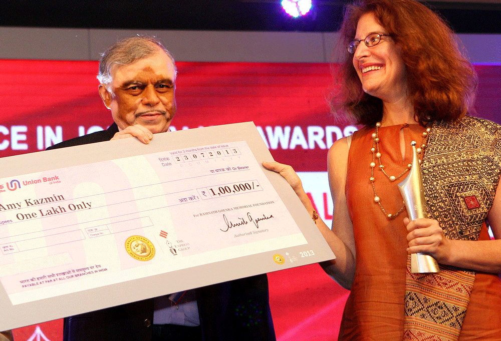 Chief Justice of India Justice P Sathasivam honours Amy Kazmin, a foreign journalist reporting in India, at the 6th edition of Ramnath Goenka Excellence in Journalism Awards in New Delhi on Tuesday. PTI Photo