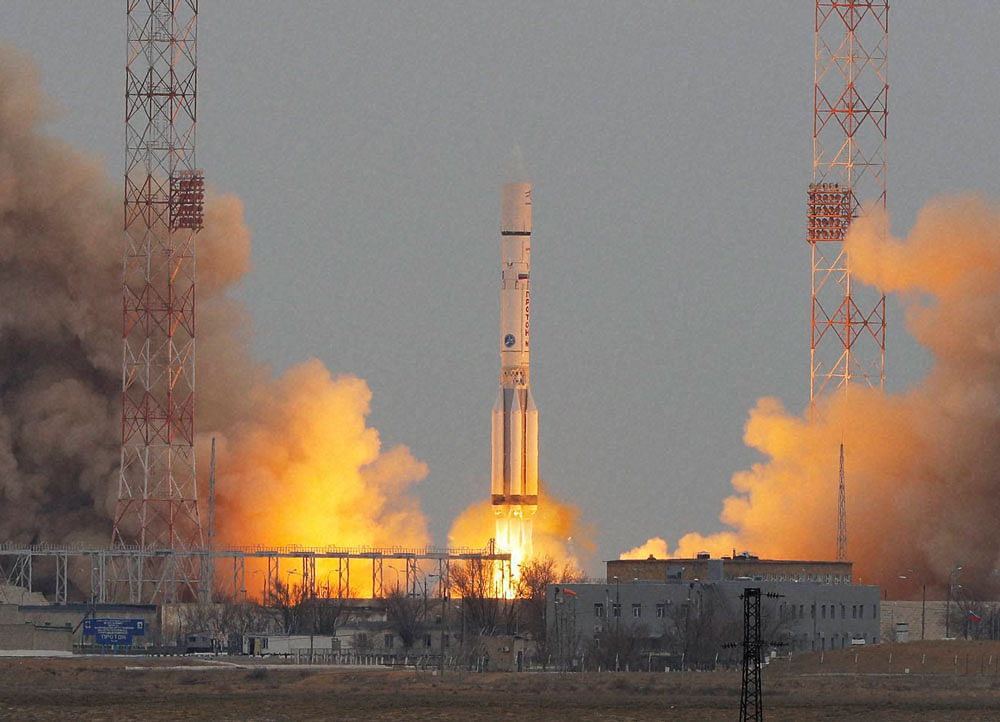 The Proton-M rocket booster blasts off at the Russian leased Baikonur cosmodrome, Kazakhstan, Monday, March 14, 2016. The Russian rocket carries an orbiter for measuring atmospheric gases of Mars and a Mars lander of the 'ExoMars 2016' mission. 'ExoM...