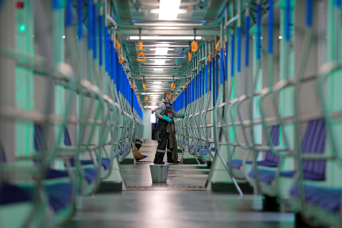 A man disinfects a subway station in Russia. (Credit: Reuters)