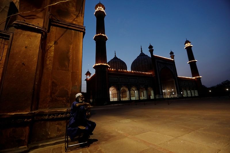 Security personnel stand guard at Jama Masjid area on the first day of holy month of Ramzan during a nationwide lockdown, in New Delhi. (AFP Photo)