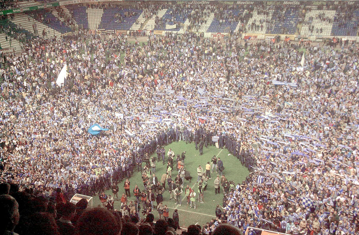 ON THIS DAY -- May 19 May 19, 2000 SOCCER - Deportivo La Coruna fans invade the field to celebrate after they were crowned champions of La Liga for the first time in the club's history. The underdog club won the title with only 69 points, the lowest total since three points for a win was introduced in 1995. It was the first time since 1985 that neither Barcelona, Real Madrid nor Atletico Madrid had won the title. (REUTERS Photo)