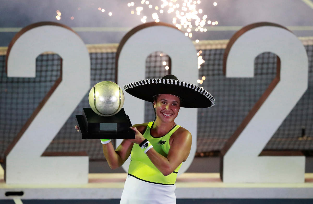 Tennis - WTA International - Acapulco Open - Princess Acapulco Stadium, Acapulco, Mexico - February 29, 2020 Britain's Heather Watson celebrates with the trophy after winning her final match against Canada's Leylah Annie Fernandez REUTERS/Henry Romero