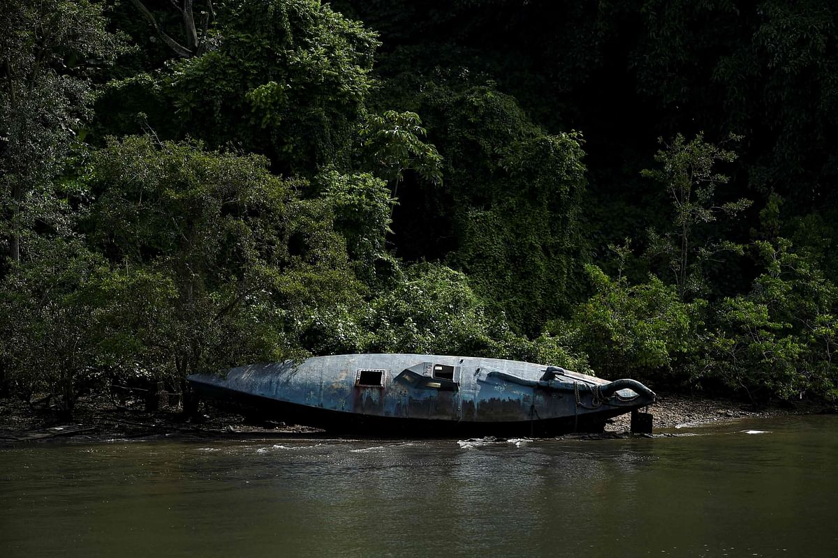 A homemade narco-submarine that has been seized is seen at the seaport of the Colombian Coast Guard in Tumaco, Colombia. (Credit: AFP)