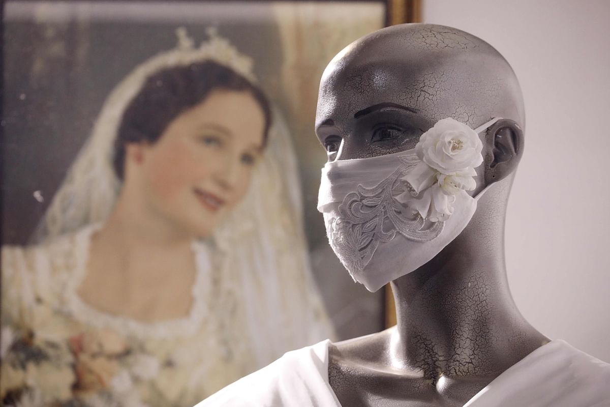 A face mask is displayed on a mannequin at a fashion retail store in Christchurch. (Credit: Reuters)