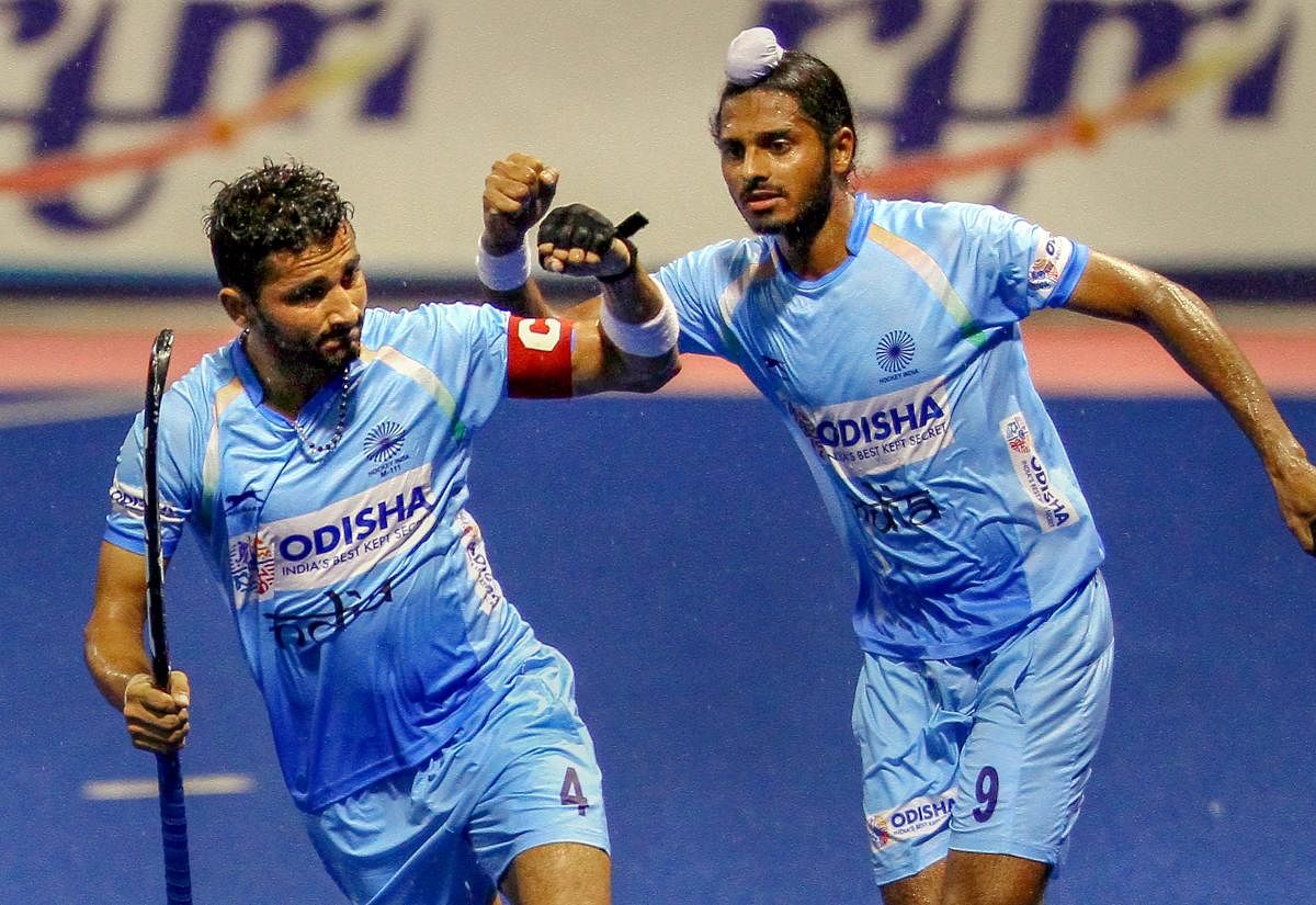 Indian Junior Men’s Hockey Team players celebrate after defeating Japan and winning the third consecutive match at the 8th Sultan of Johor Cup 2018, in Johor Bahru, Malaysia. (PTI photo)