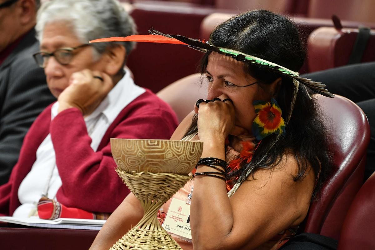 A representative of one of the Amazon Rainforest's ethnic groups at the Special Assembly of the Synod of Bishops for the Pan-Amazon Region in the Vatican. (Photo yb AFP)