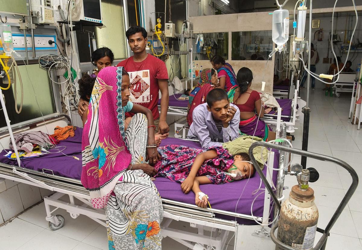 Children showing symptoms of Acute Encephalitis Syndrome (AES) being treated at Shri Krishna Medical College and hospital in Muzaffarpur, Sunday, June 16, 2019. With one more death of a child on Sunday morning, the death toll in the district rose to 83 this month. PTI