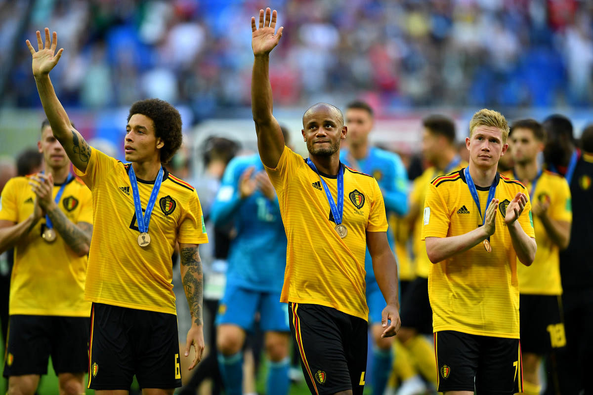 Belgium's Axel Witsel, Vincent Kompany and Kevin De Bruyne after receiving the bronze World Cup medal Reuters   Photo