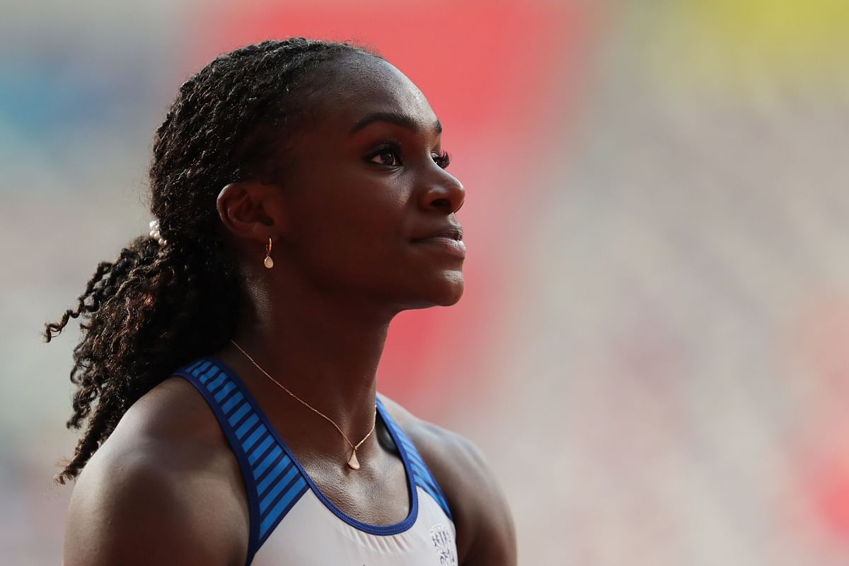 Britain's Dina Asher-Smith waits for the results after competing in the Women's 100m heats at the 2019 IAAF World Athletics Championships at the Khalifa International stadium in Doha. AFP