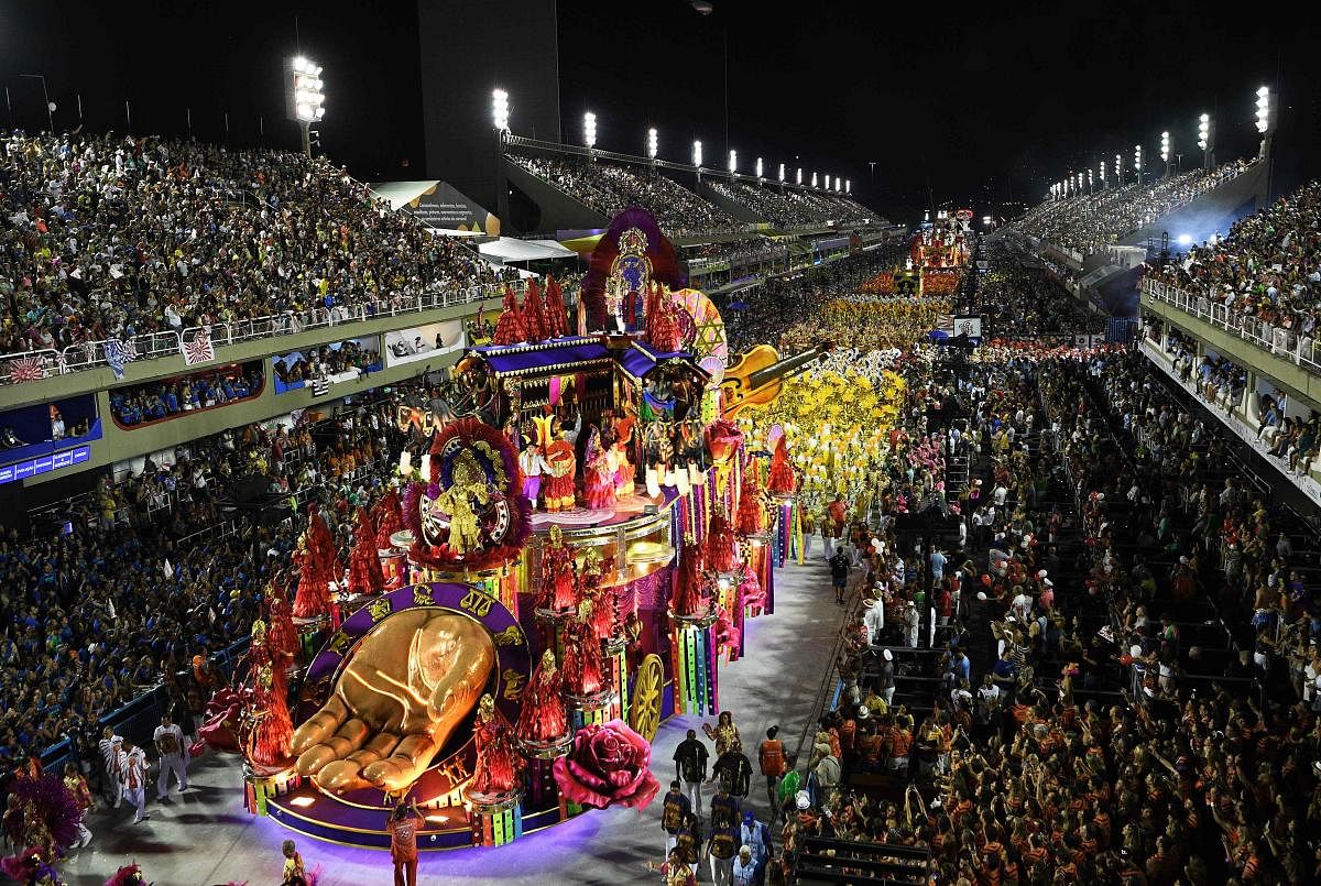 Members of the Salgueiro samba school perform during the last night of Rio's Carnival parade at the Sambadrome Marques de Sapucai in Rio de Janeiro, Brazil. (AFP Photo)