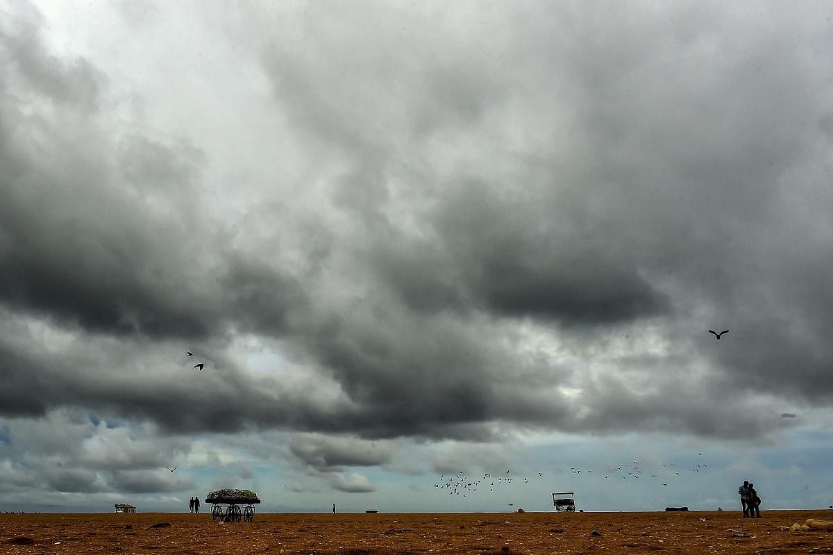 Clouds hover in the sky over Marina beach in Chennai. PTI photo