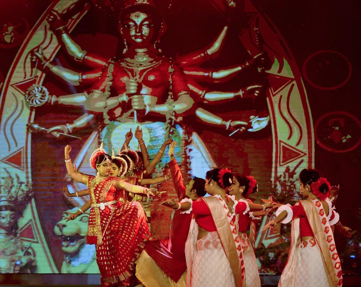 Eminent dancer Dona Ganguly with her troupe performs during the closing ceremony of 24th Kolkata International Film Festival in Kolkata.  PTI photo