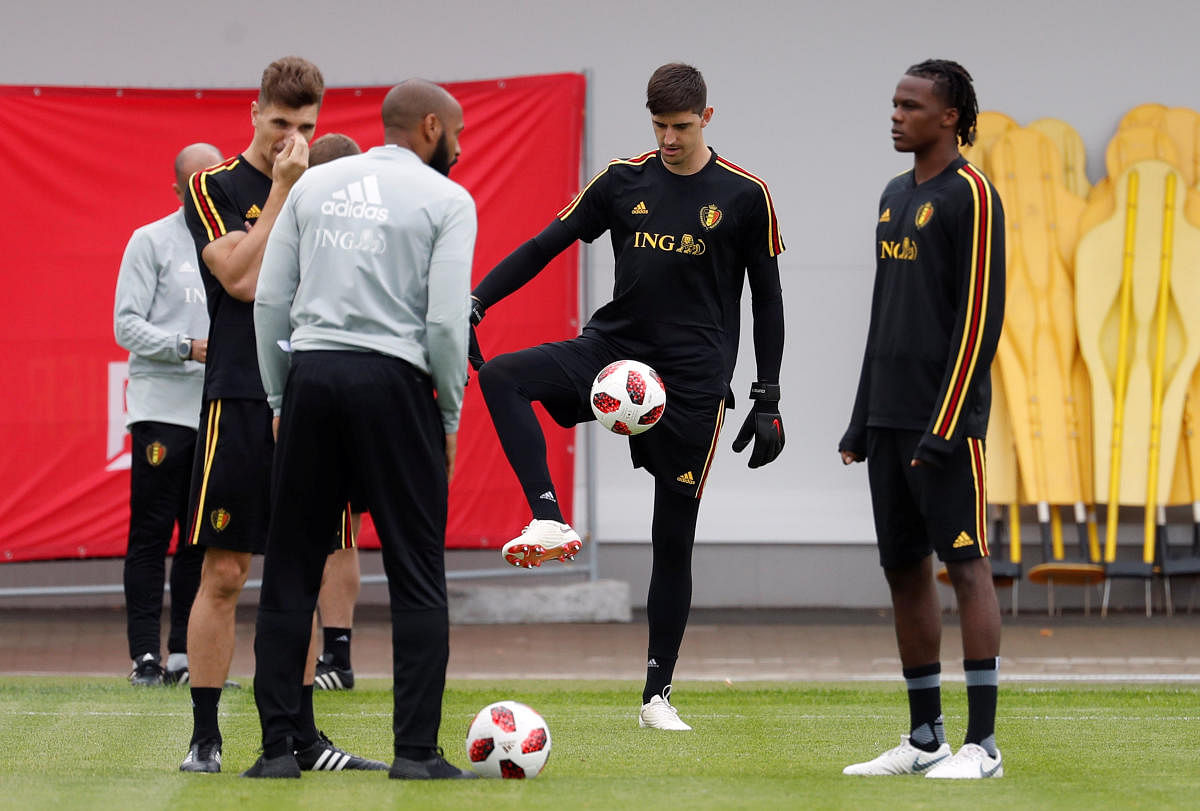 Belgium assistant coach Thierry Henry, Thibaut Courtois and Dedryck Boyata during training. Reuters